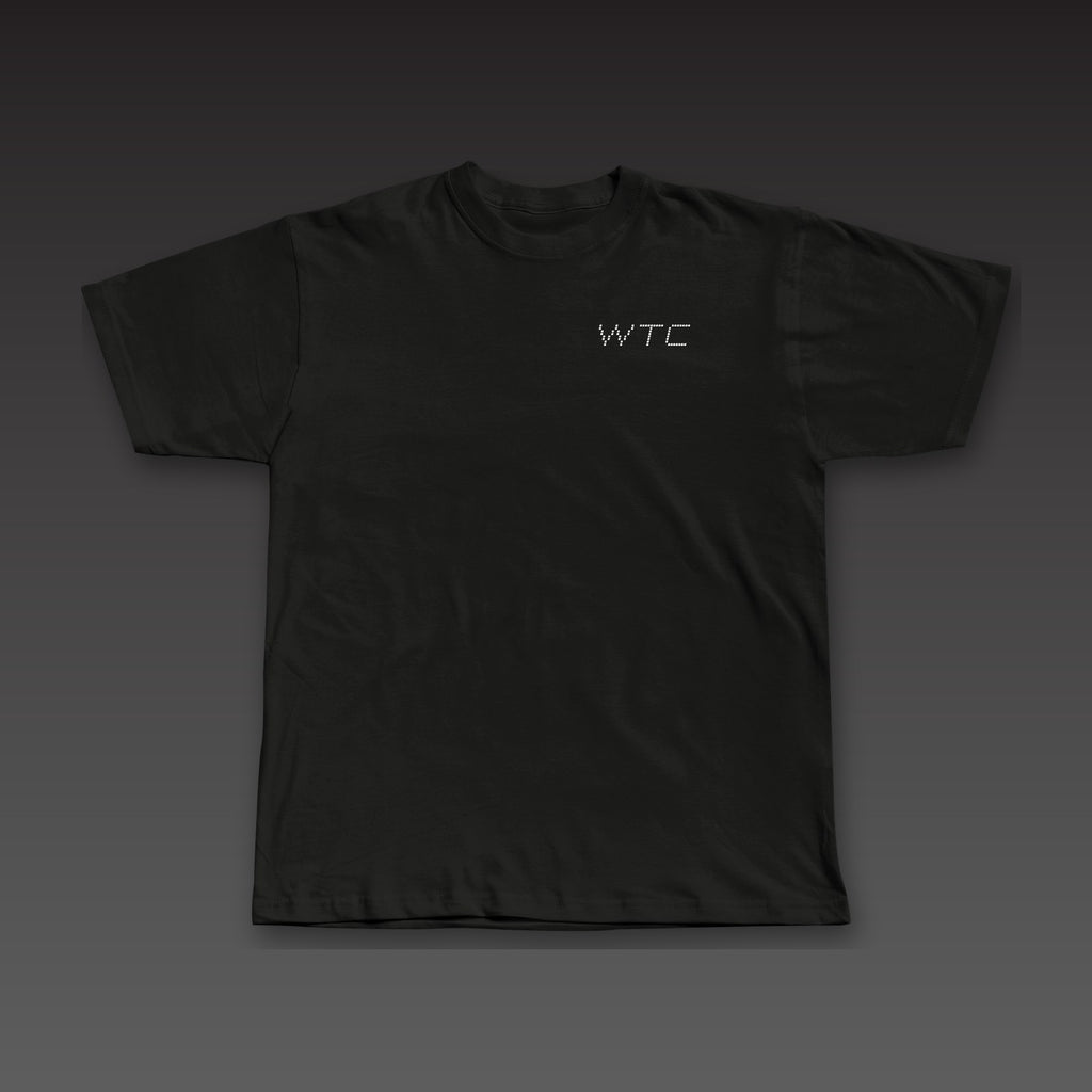 Split Decision Tee in black, dotted Work the Cut stacked on the left chest