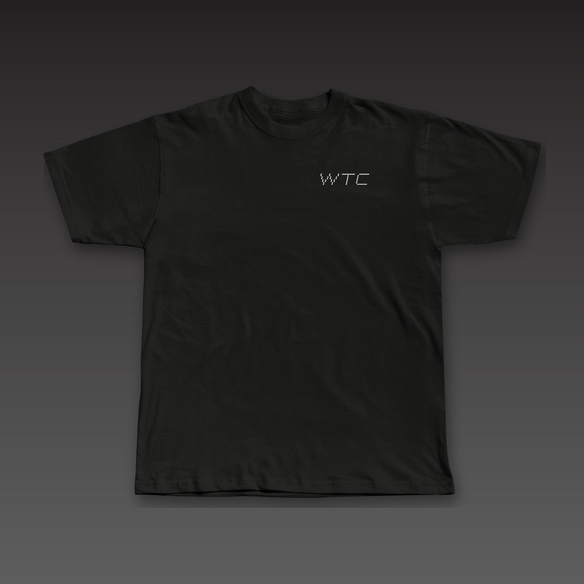 Split Decision Tee in black, dotted Work the Cut stacked on the left chest