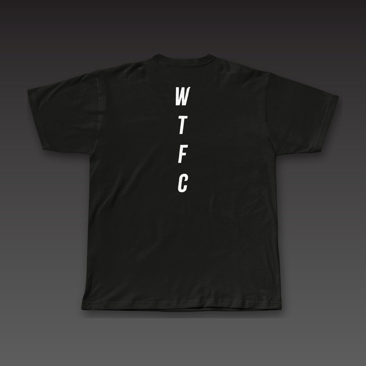 Fine Print Tee in black, WTFC running down the back
