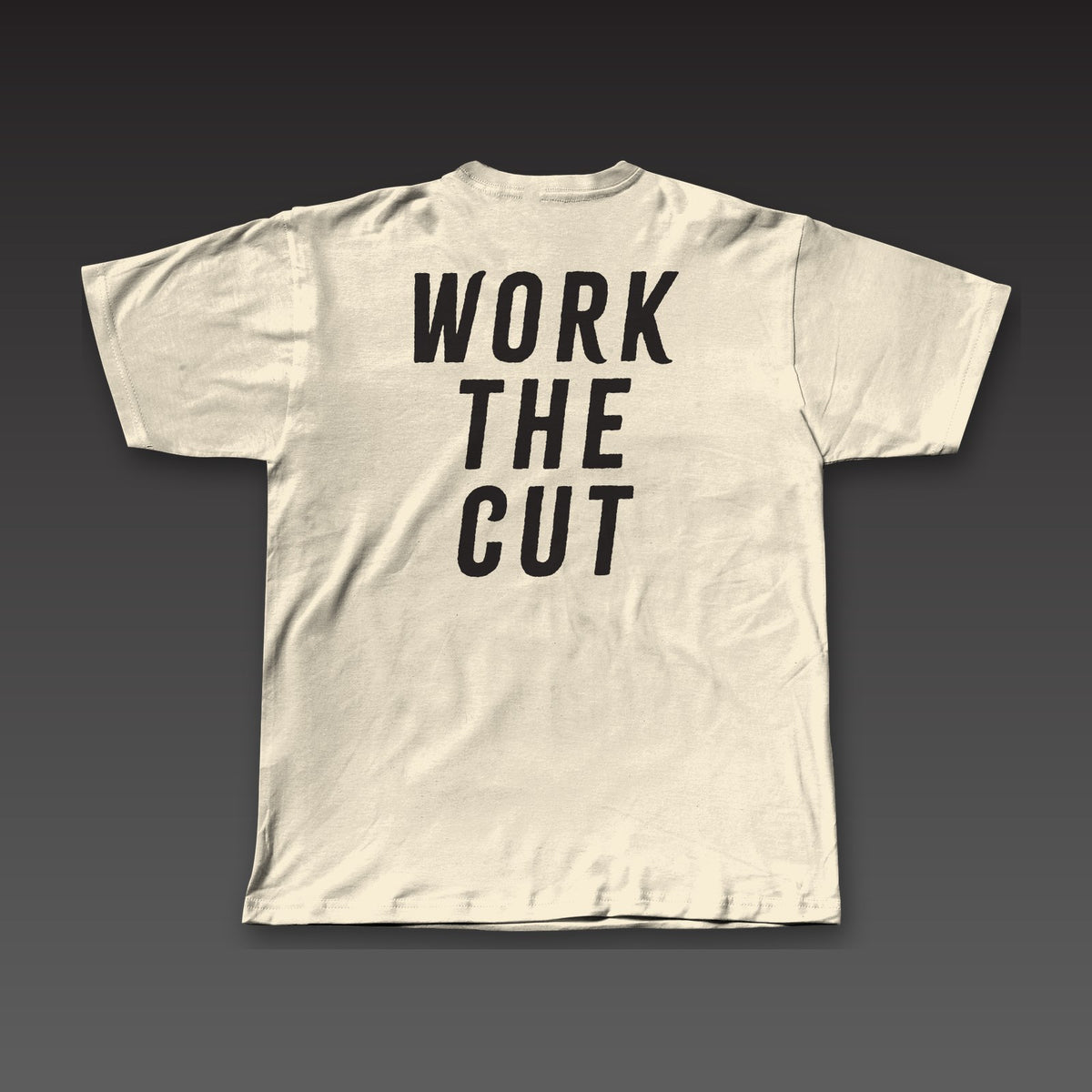 The Jab Tee in oatmeal, Work the Cut stacked across the back