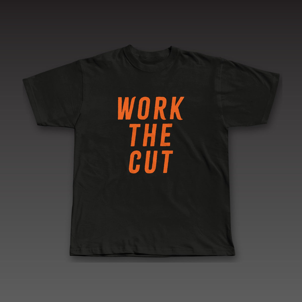 Headliner Tee in black / orange, Work the Cut stacked down the whole front
