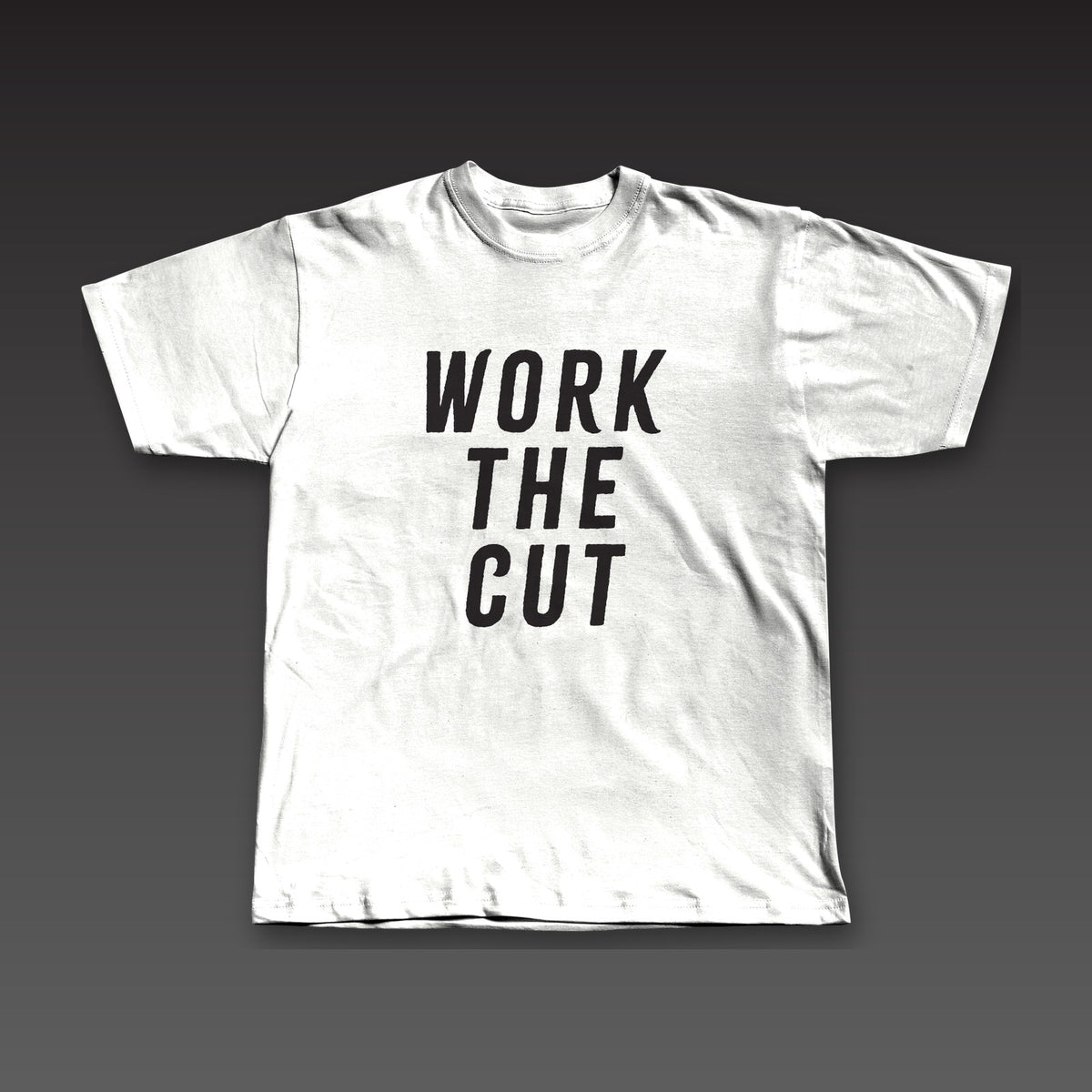 Headliner Tee in white, Work the Cut stacked down the whole front