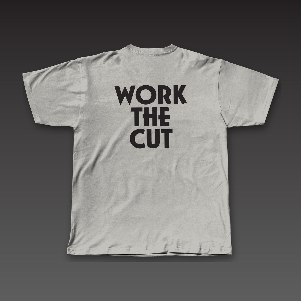 Heavyweight Tee in athletic grey, Work the Cut stacked in geometric letters across the back
