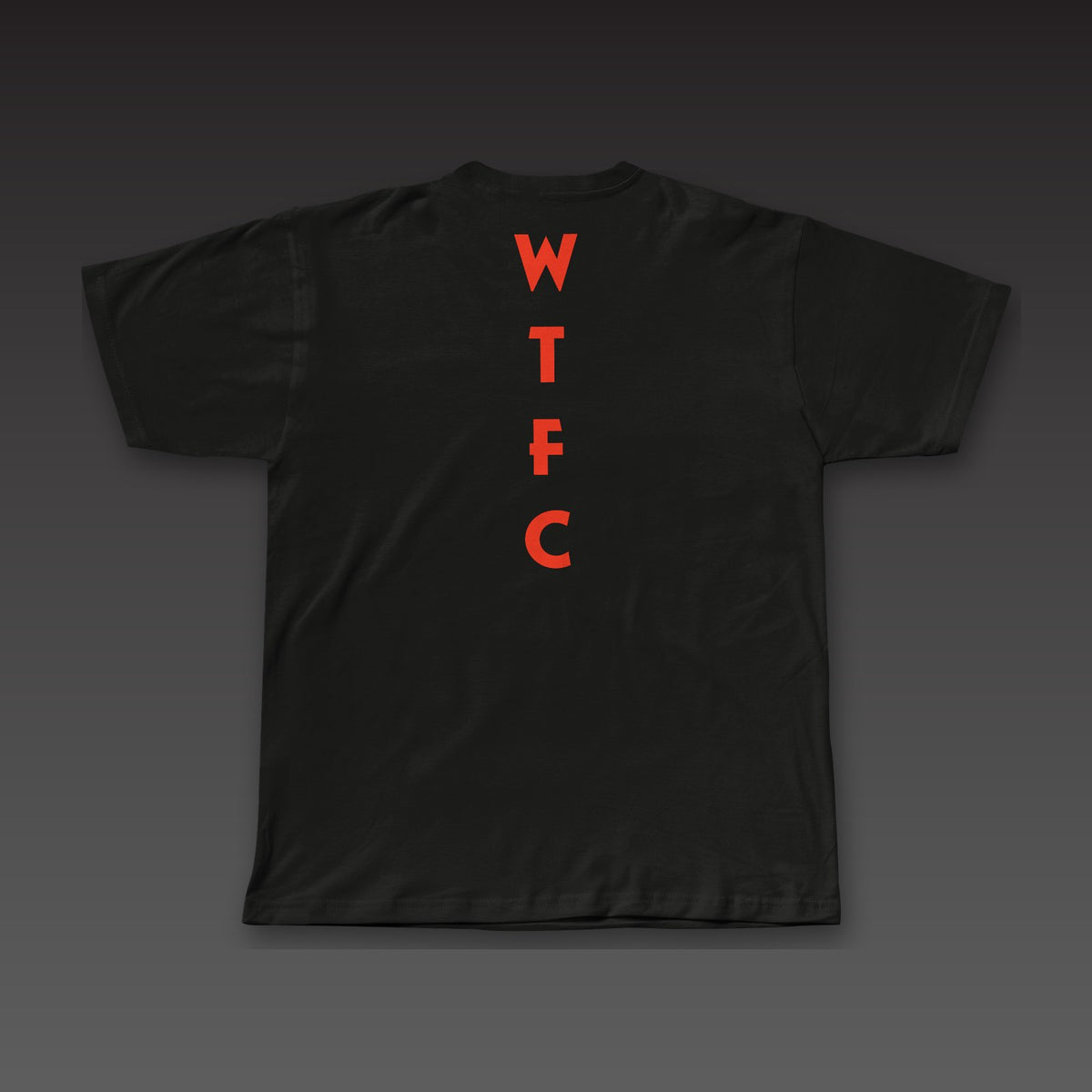 Uppercut Tee in black / blood orange, geometric WTFC running down the spine