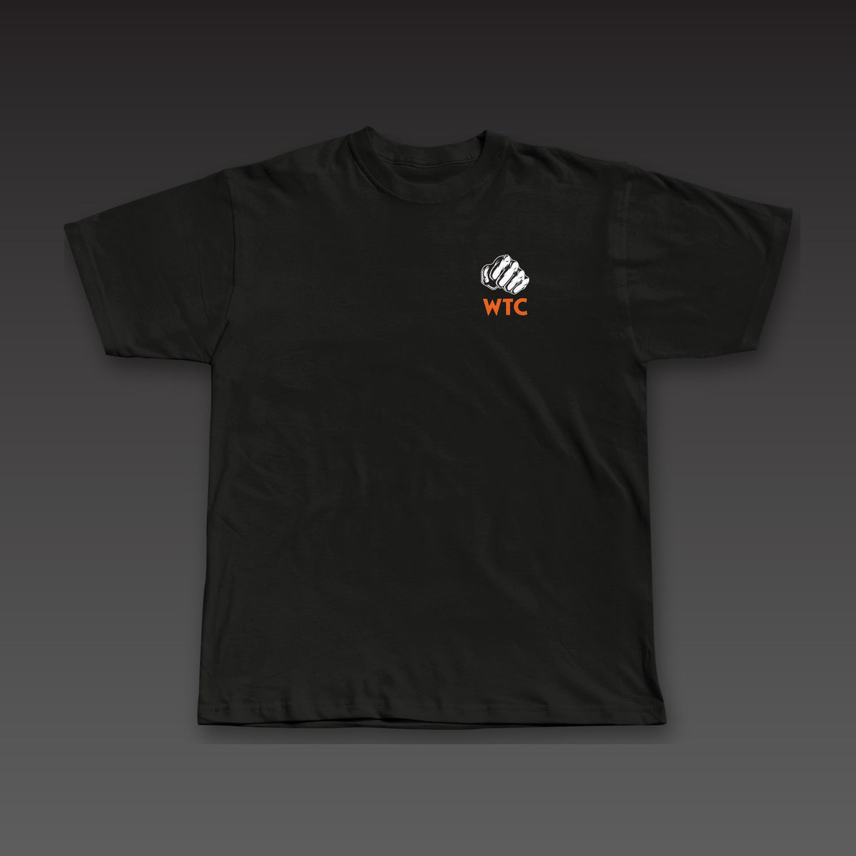 OG Tee in black / orange, a fist over WTC on the left chest