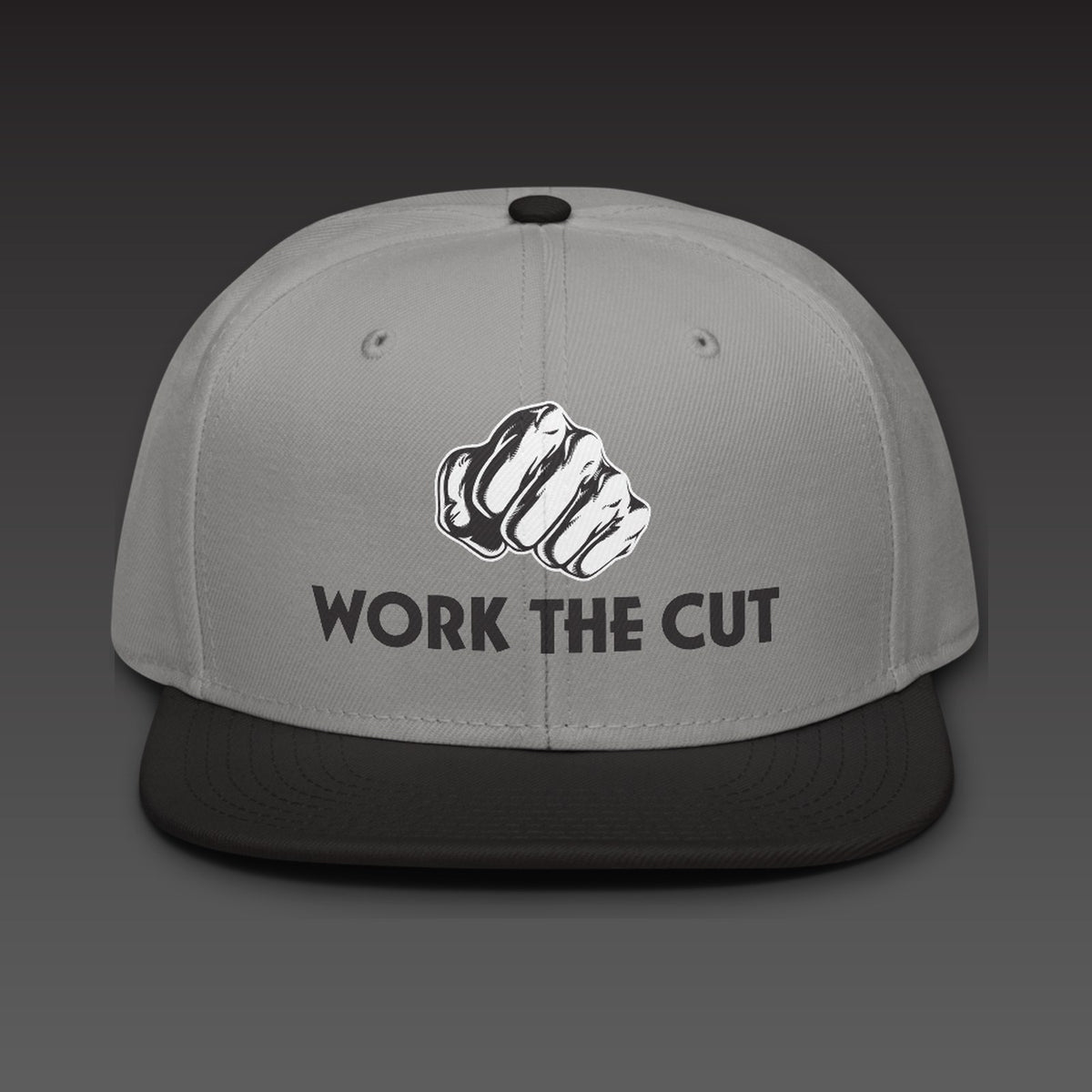 OG Fist Flat Bill in grey / black, the fist over WORK THE CUT in black type, printed on the front