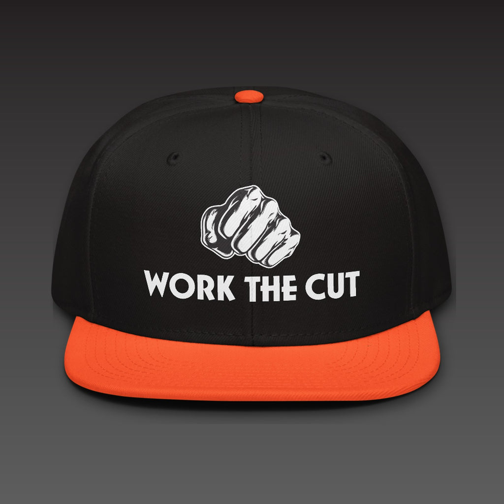 OG Fist Flat Bill in orange visor, the fist over WORK THE CUT in white type, printed on the front