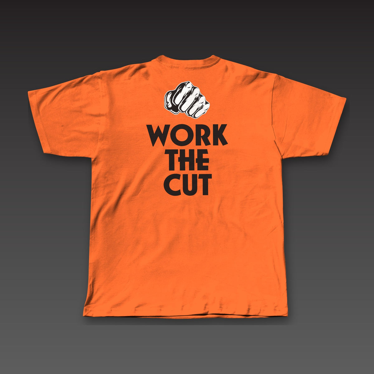 OG Tee in orange, a fist over Work the Cut stacked across the back