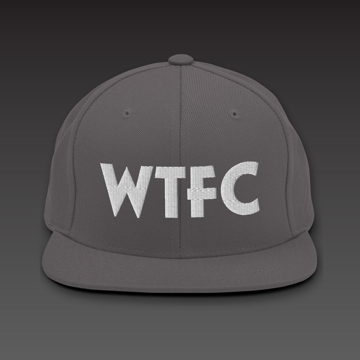 Puff Snapback in dark grey / white, WTFC in white 3D puff embroidery on the front