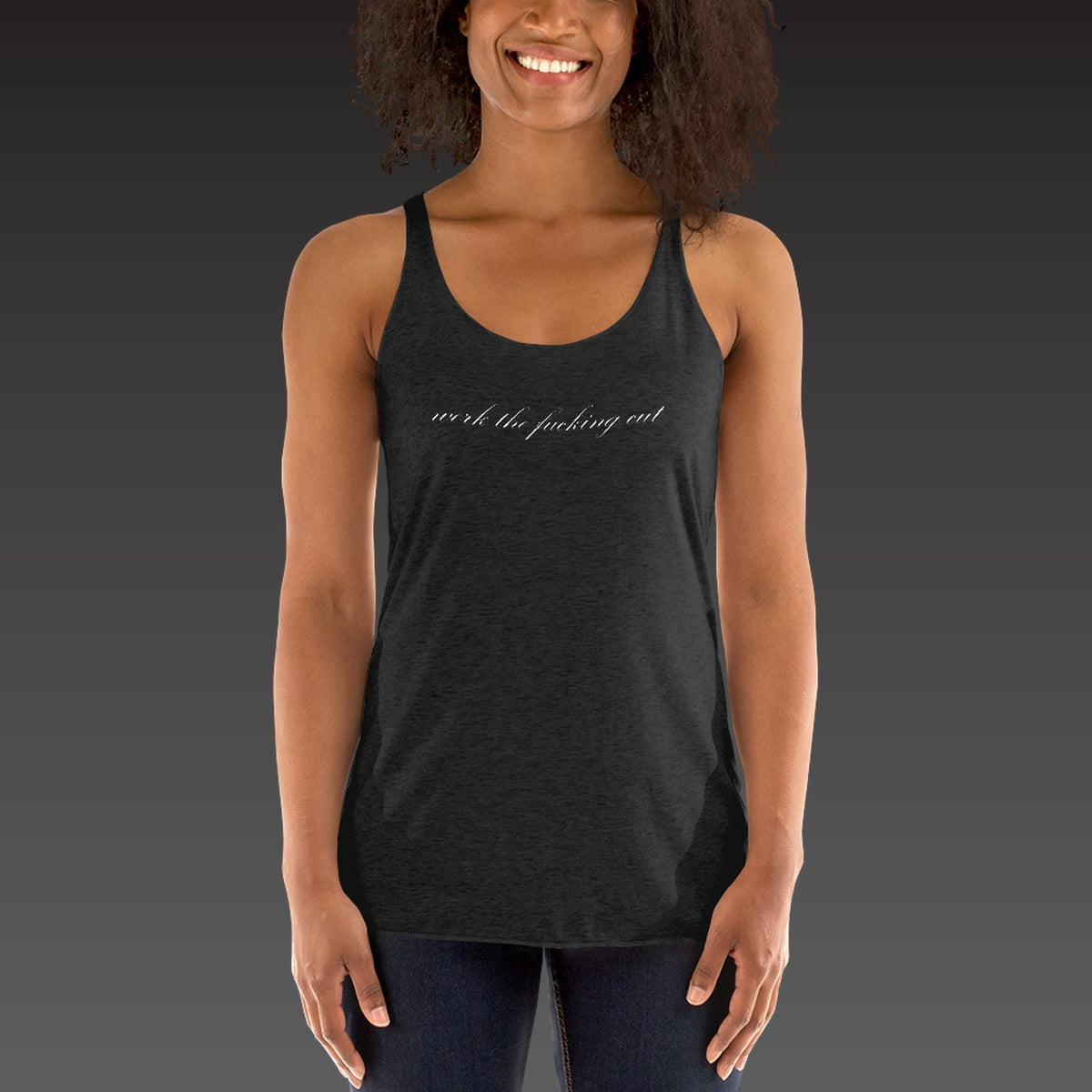 Script Chest Tank in vintage black, the phrase in white script across the chest, shown on a model