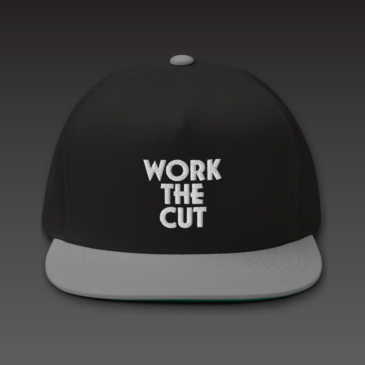 Stack Five-Panel in grey visor, WORK THE CUT stacked in white embroidery on the front