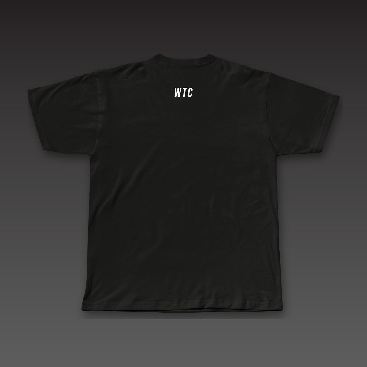 Late Rounds Tee in black, a small WTC below the back collar