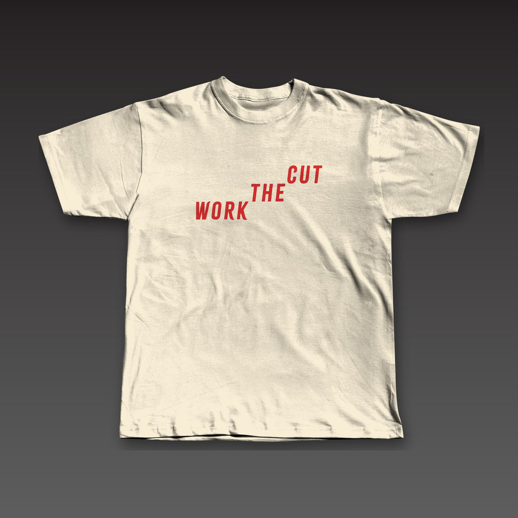 Late Rounds Tee in oatmeal / red, Work the Cut climbing up across the chest