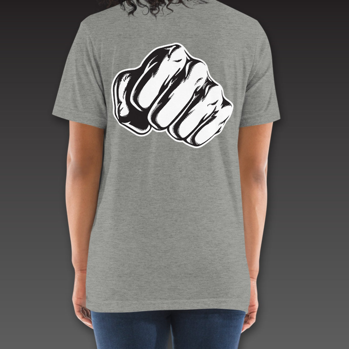 Women's Haymaker Tee in athletic grey, a single fist across the full back