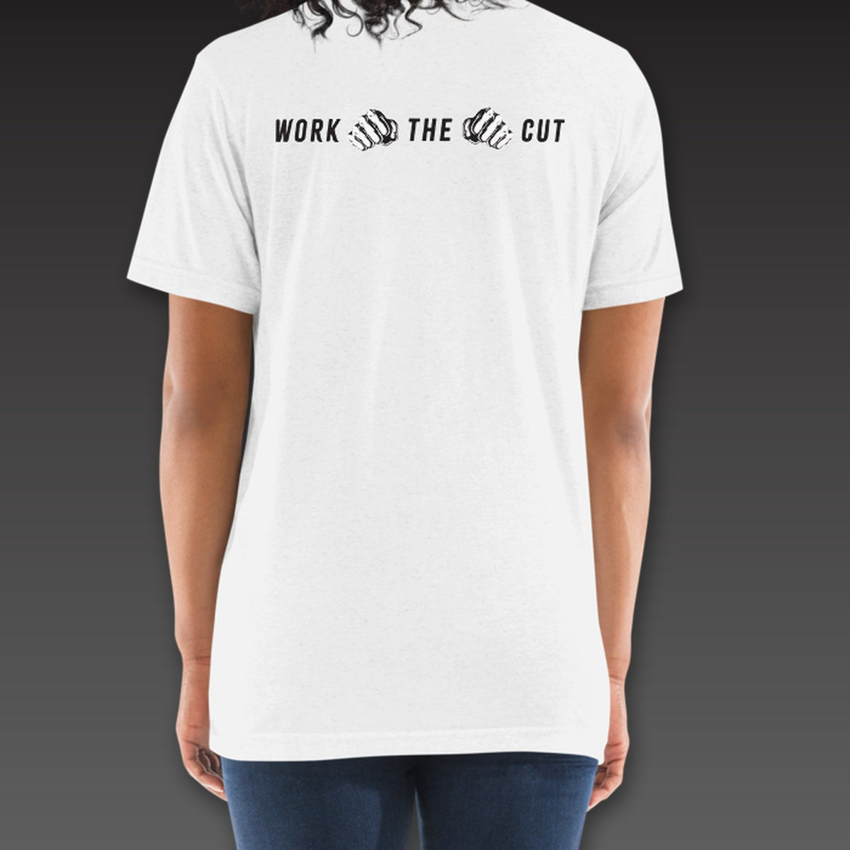 Women's One-Two Tee in white, Work the Cut in a row with fists below the collar