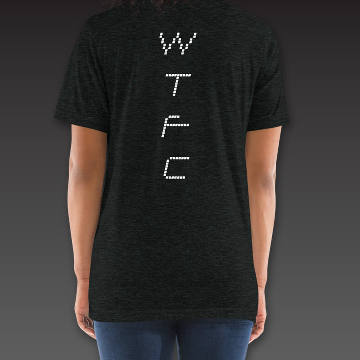 Women's Split Decision Tee in charcoal black, dotted WTFC running down the back