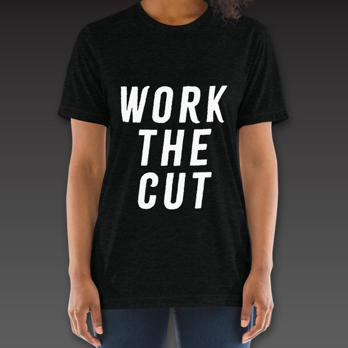 Women's Headliner Tee in black, Work the Cut stacked down the whole front