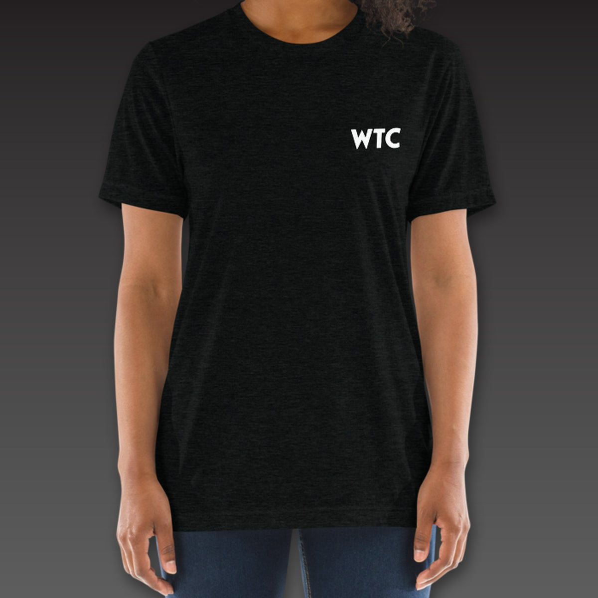 Women's Heavyweight Tee in black, geometric WTC on the left chest