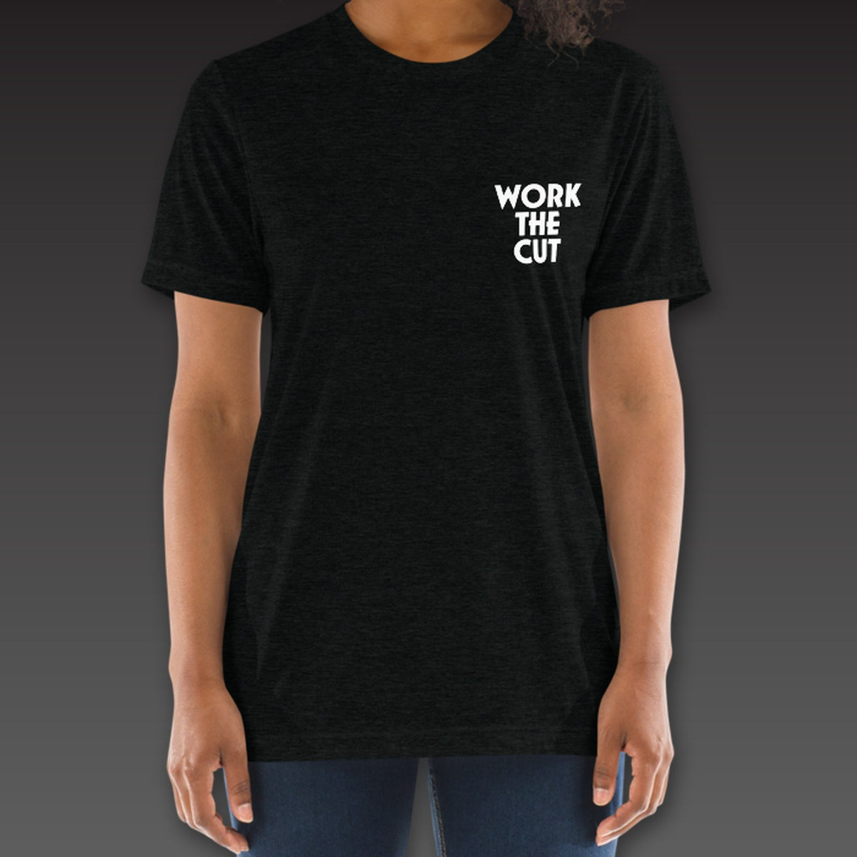 Women's Uppercut Tee in black, geometric Work the Cut stacked on the left chest